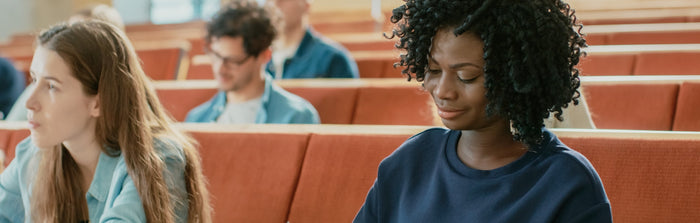 a man is talking to a classroom full of parents